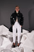 64-8 Patent leather coat with cut sleeves and press stud placket