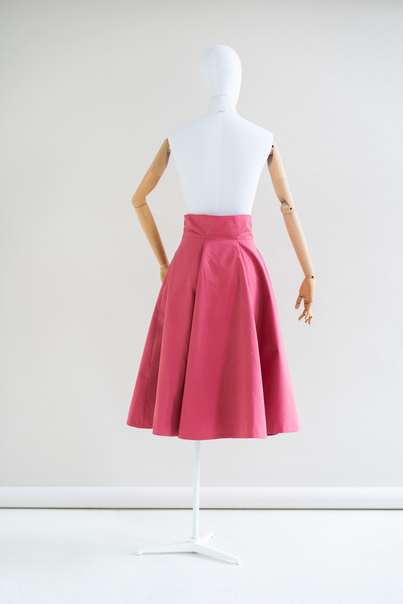 Pink pencil skirt top 7 little words