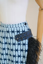 28-5 ANGLED Asymmetrical skirt with (button) tab and optional feather trim
