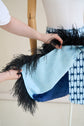 28-5 ANGLED Asymmetrical skirt with (button) tab and optional feather trim