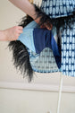 28-5 ANGLED Asymmetrical skirt with (button) tab and optional feather trim