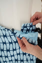 28-5 ANGLED Asymmetrical skirt with (button) tab and optional feather trim