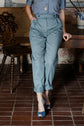 48-1 Pleated trousers with welt pockets / rolled-up trouser legs